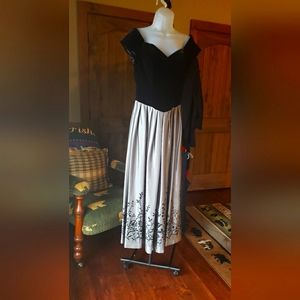 Dressy velvet top dress. Embellished shiny silver skirt.